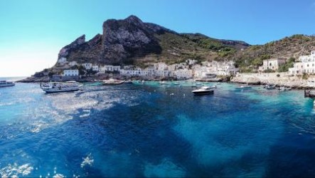 Le Spiaggette Sassose ed il Tramonto del Faraglione